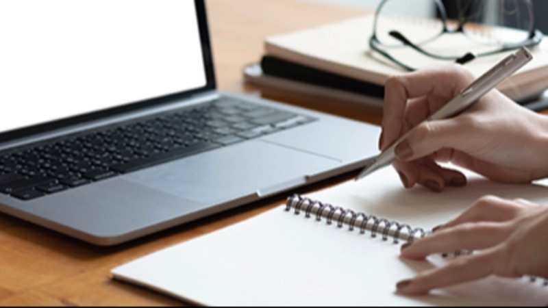 Person Signing a Form