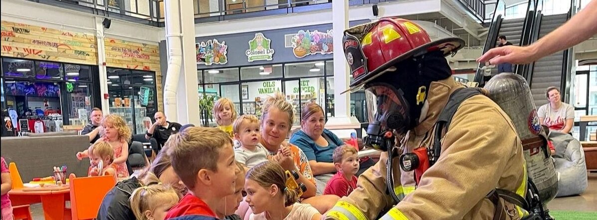 Kids with firefighter in Newport KY